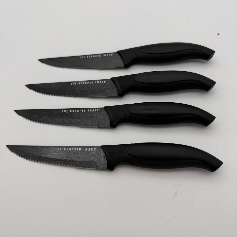 The Sharper Image 4 Piece Steak Knife Set Black Non-Stick Serrated Blade Utility
